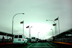 Leaving Ciudad Juárez, we cross on of the bridges that lead into El Paso, Texas, on Nov. 22, 2013. The sign reads, "Happy Travels."