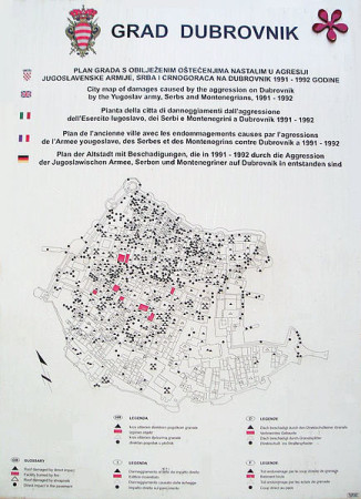 Map in Dubrovnik that shows the extent of war damage in the Old Town. The triangles represent direct impacts while the red shadings represent fires. Joy [Public domain], via Wikimedia Commons